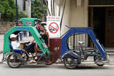 Велорикши в Интрамуросе в Маниле