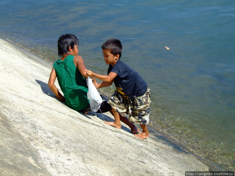 Взаимопомощь Пуэрто-Принсеса, остров Палаван, Филиппины
