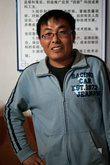 Геодезист в полевом штабе на дороге в Лицзян.