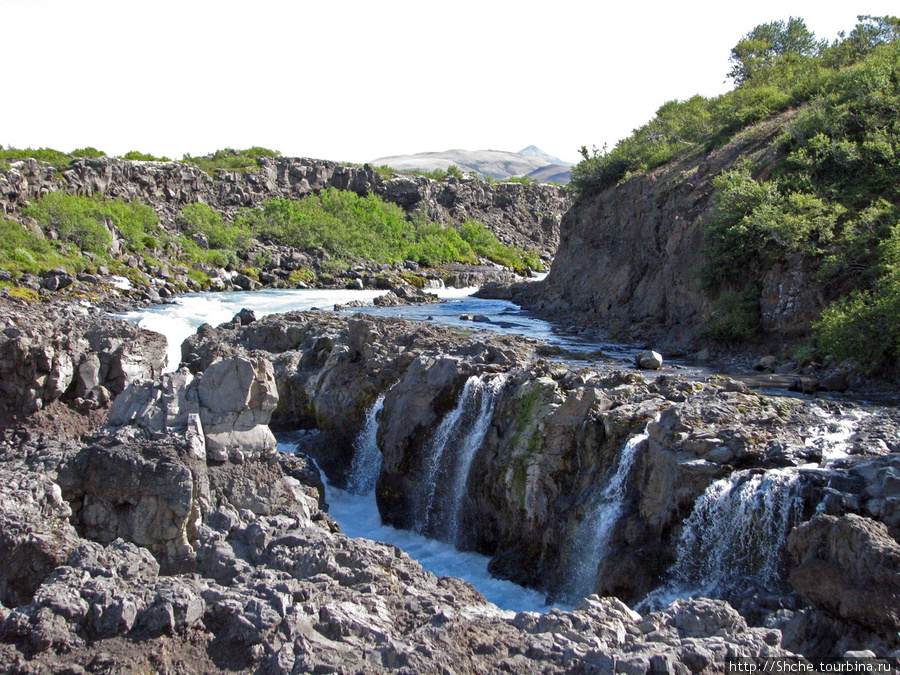 Это вид верховья водопада с правого берега реки Хусафетль, Исландия