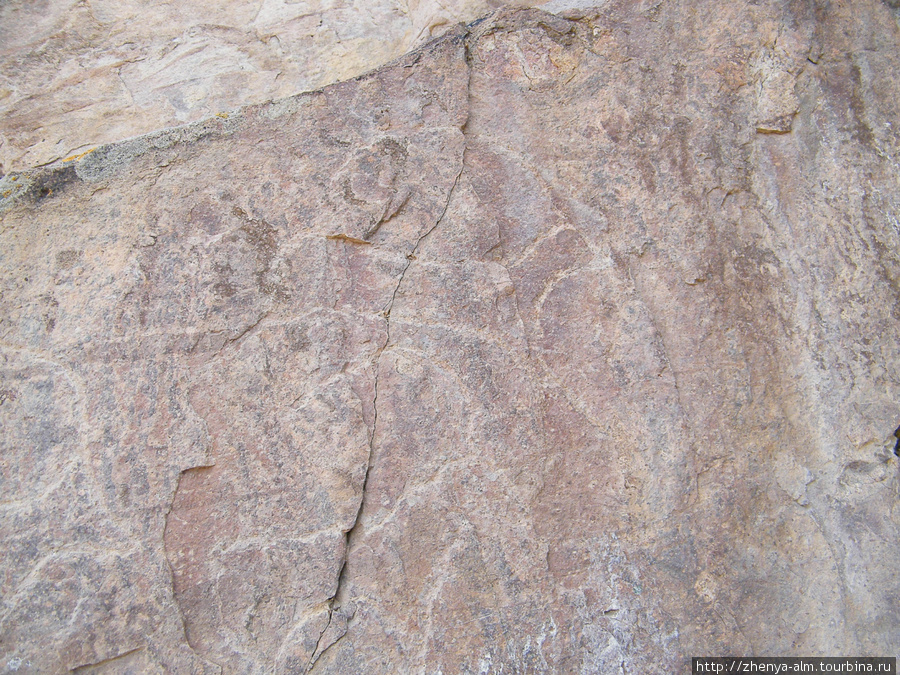 а этим петроглифам более 2000 лет Урочище Тамгалы-Тас (петроглифы), Казахстан