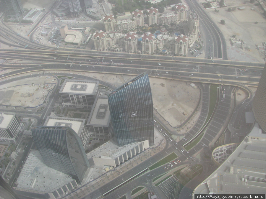 Вид со смотровой площадки Бурж Дубай. С погодой не повезло — была пустынная буря...(( Дубай, ОАЭ