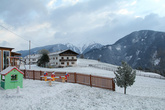 Детская площадка на фоне Альп