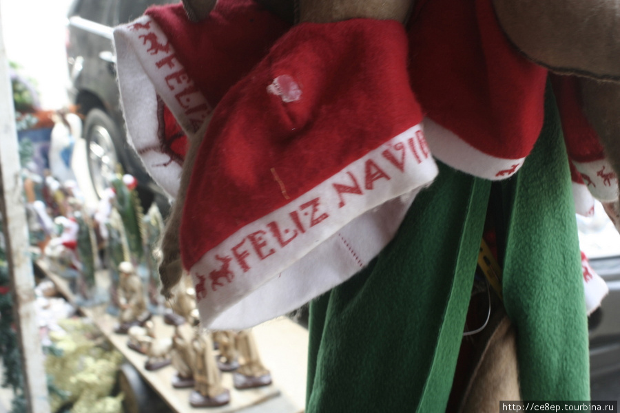 Шапки Feliz navidad — с рождеством повсюду Вильяэрмоса, Мексика