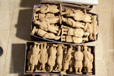 Глиняные солдатики в коробке