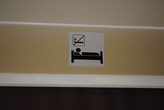 Не курить в кровати. Знак в поезде