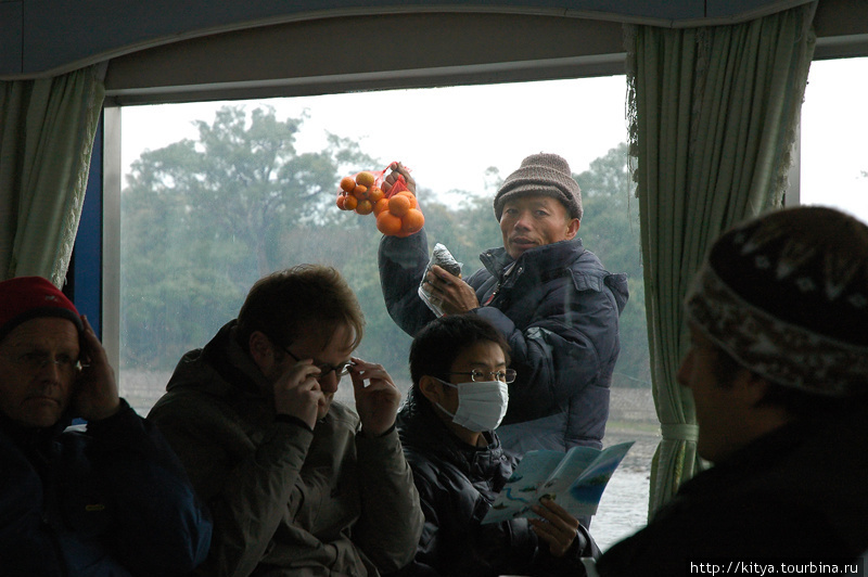 Продавец мандаринов Гуйлинь, Китай
