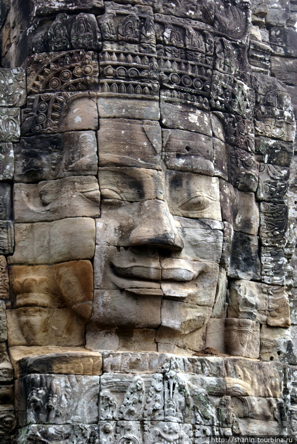 Лицо в храме Байон Ангкор (столица государства кхмеров), Камбоджа