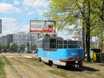 Грузовой вагон на базе трамвая Татра Т3 следует по Московскому проспекту (пересекает площадь Восстания).