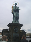 Статуя  Святого Яна Непомуцкого на Карловом мосту.