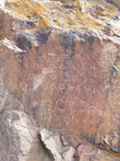 Этим древним петроглифам около 50 лет — они были нанесены специально для съемок фильма. Это тамга — родовые знаки казахов.