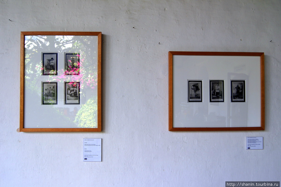Фотографии на стене Антигуа, Гватемала