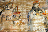 Еле-еле различимые фрески на стене монастыря
