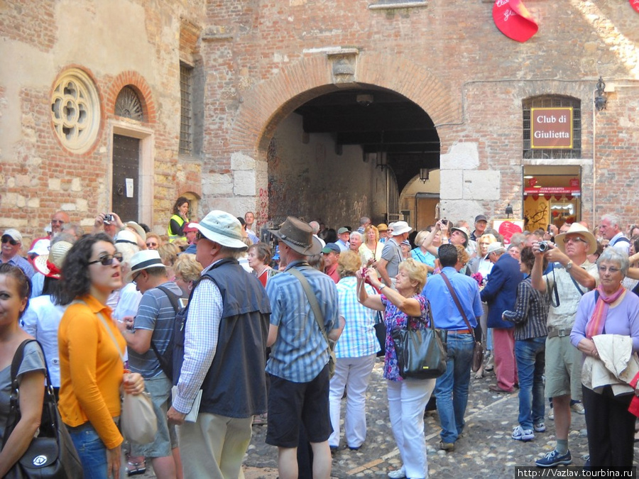 Туристы за работой Верона, Италия