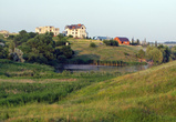 буквально через 100 метров показался пруд и окраина села Большая Рогань