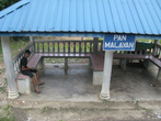 Платформа Пан Малайян, и сам пан тут же сидит (снимок на ходу с поезда)